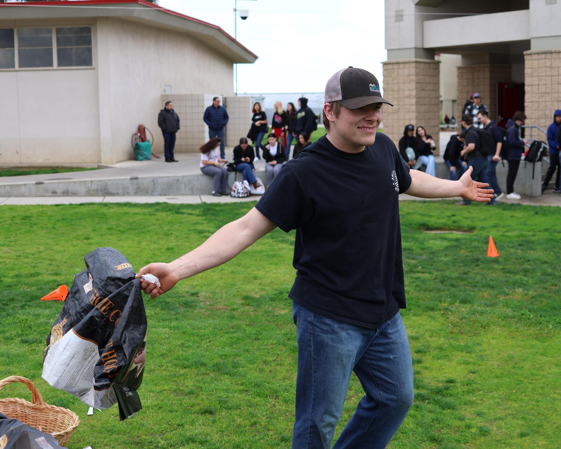 students and staff enjoying the feed bag relay