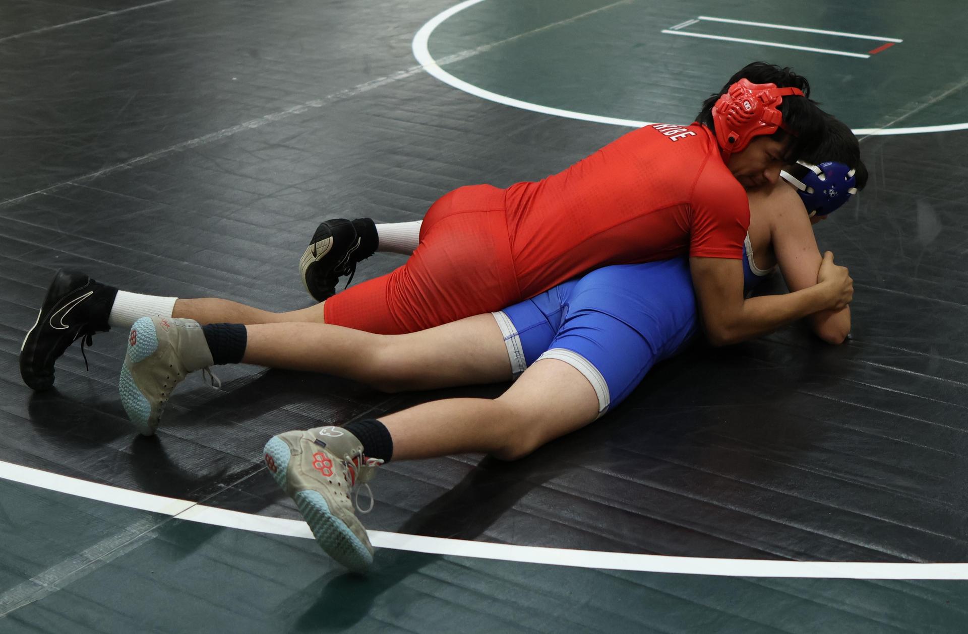 Boys wrestling in the Liberty Duals event 18