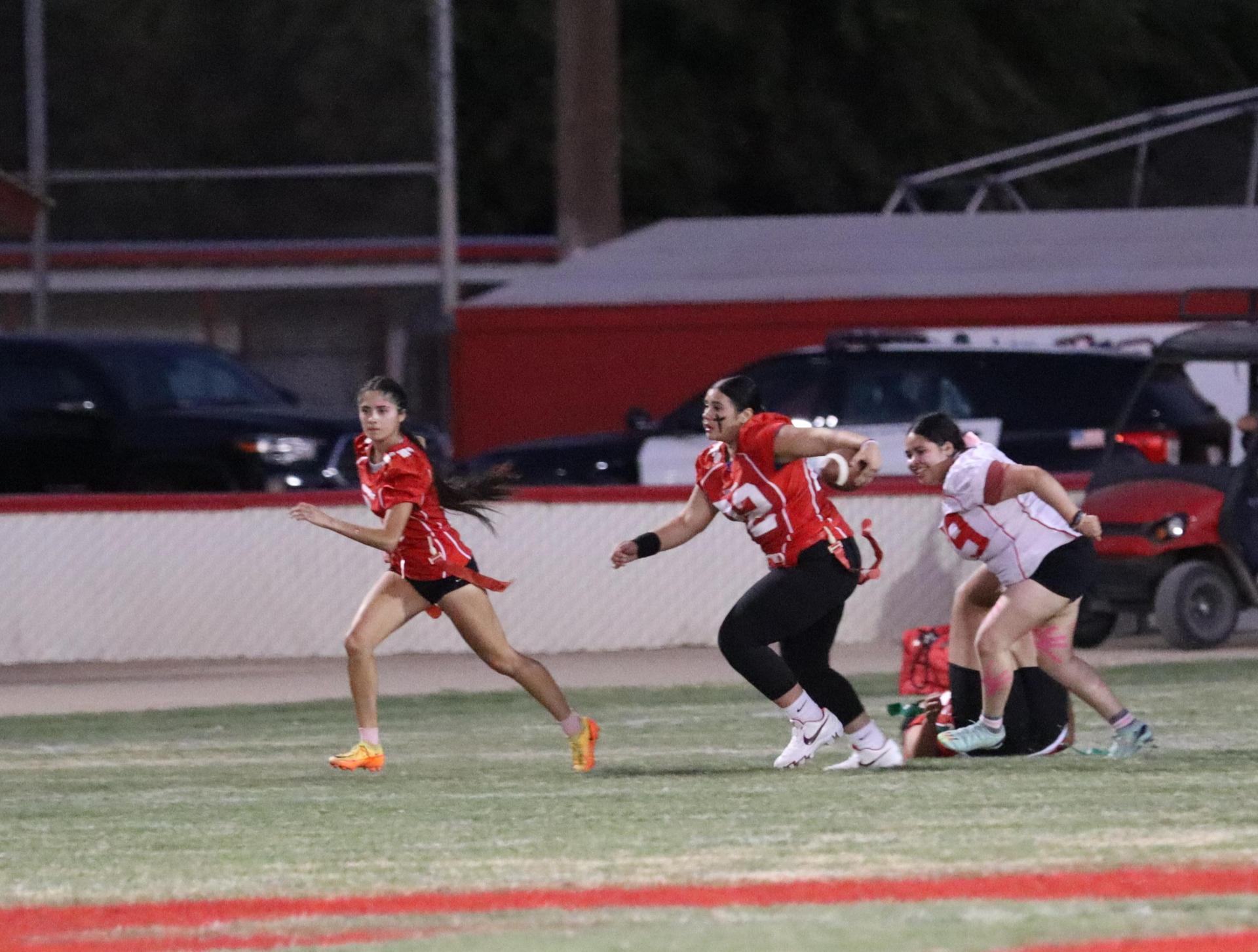 girls playing flag football