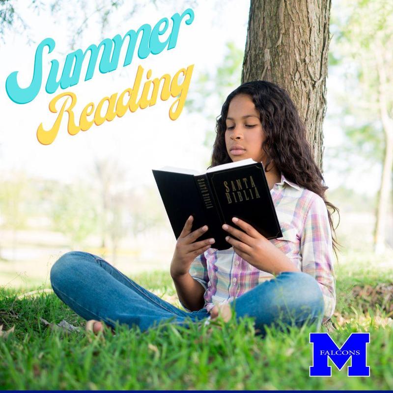 Reading a book while leaning up against a tree