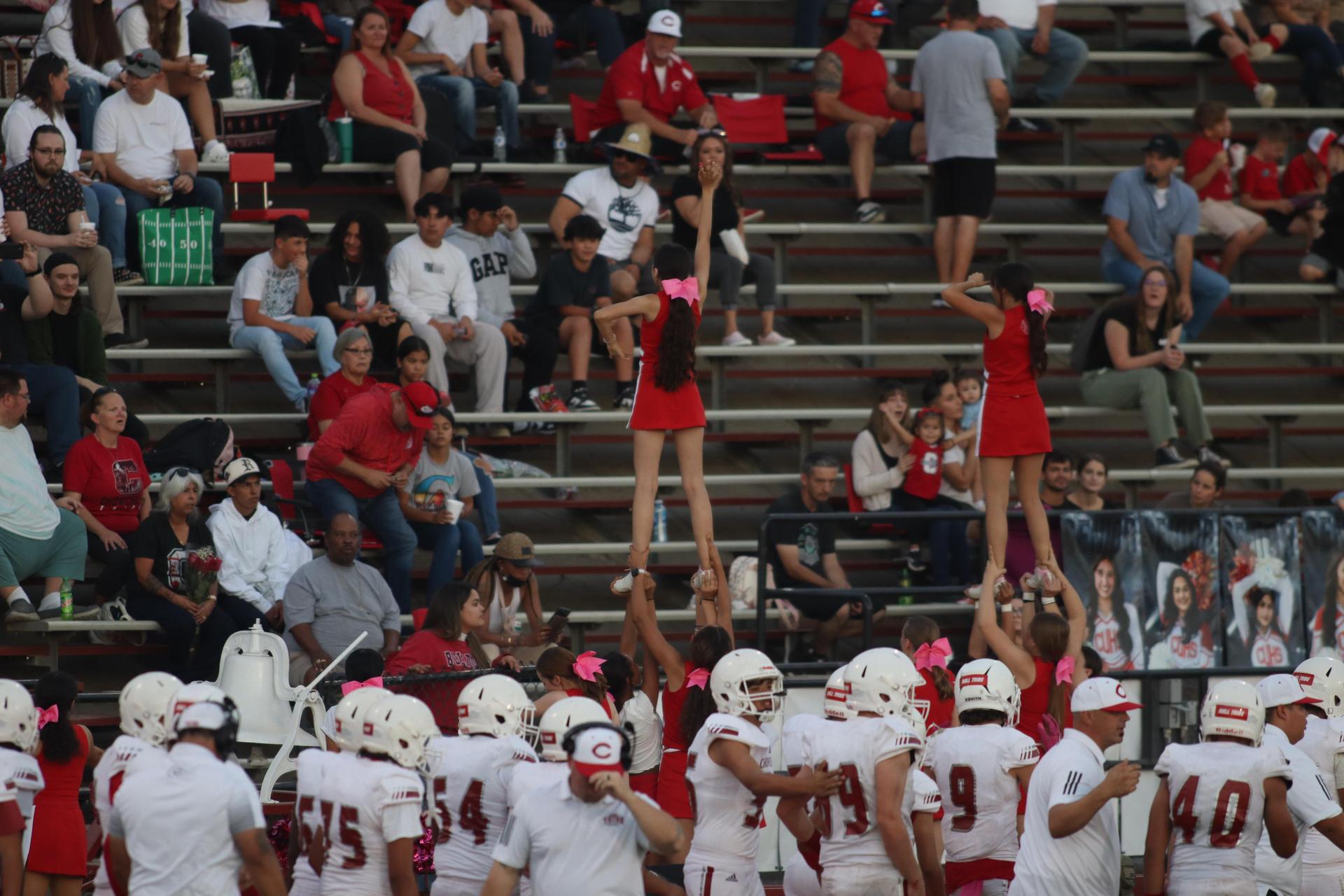 Junior Varsity football players in action against Caruthers