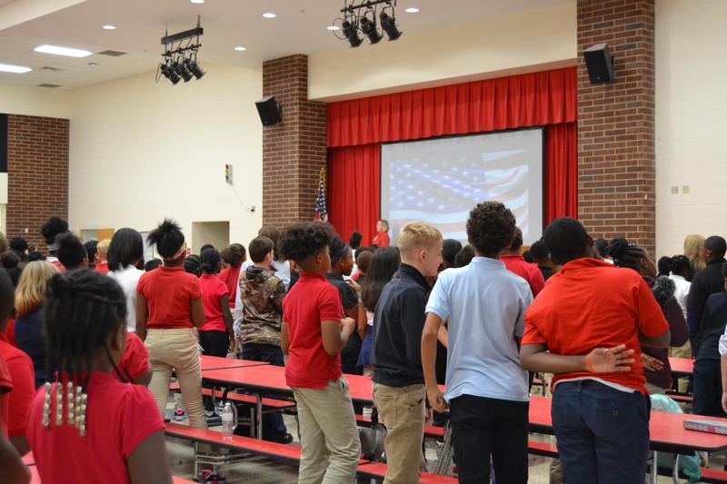 students saying Pledge of Allegiance