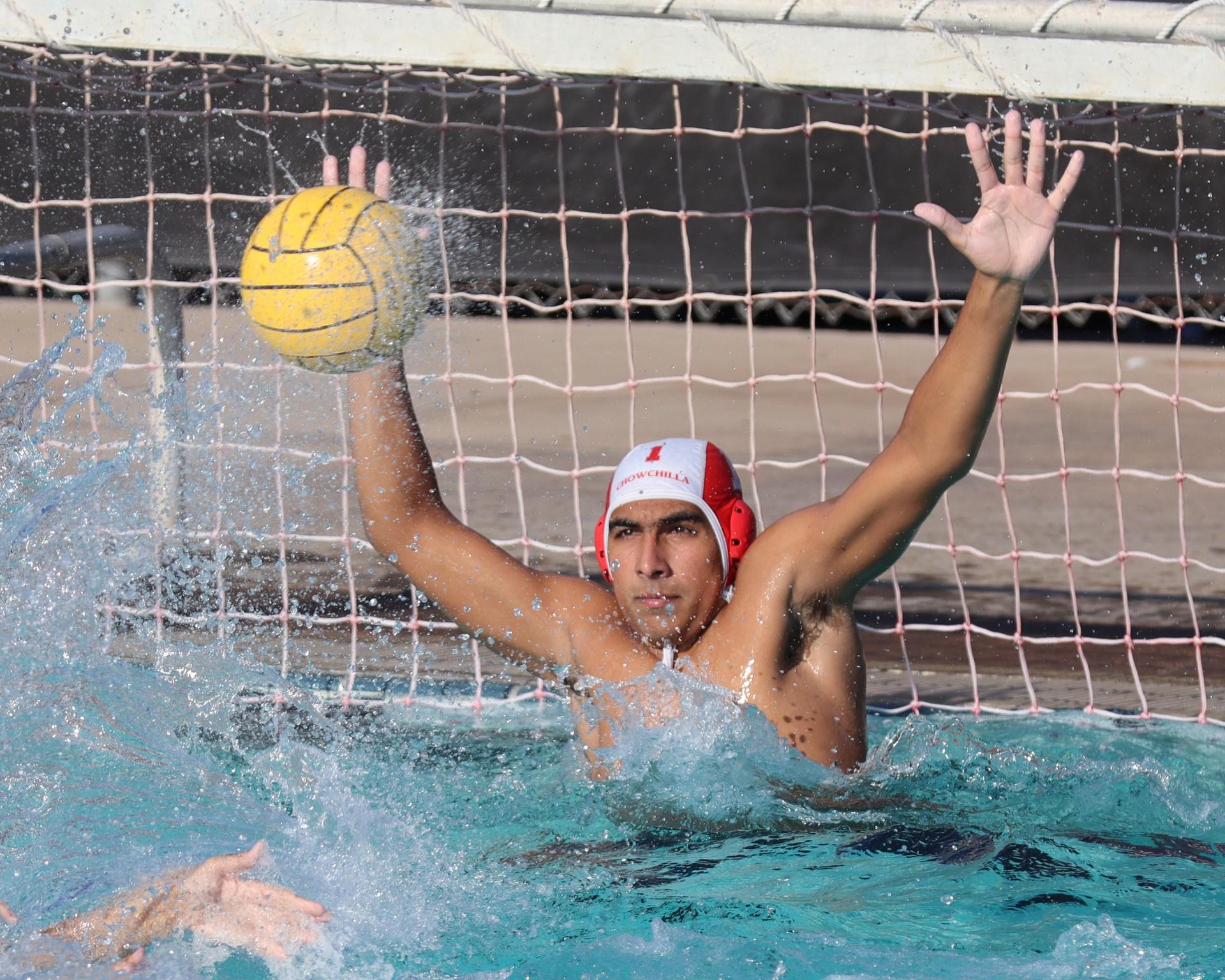 Boys playing water polo against Yosemite