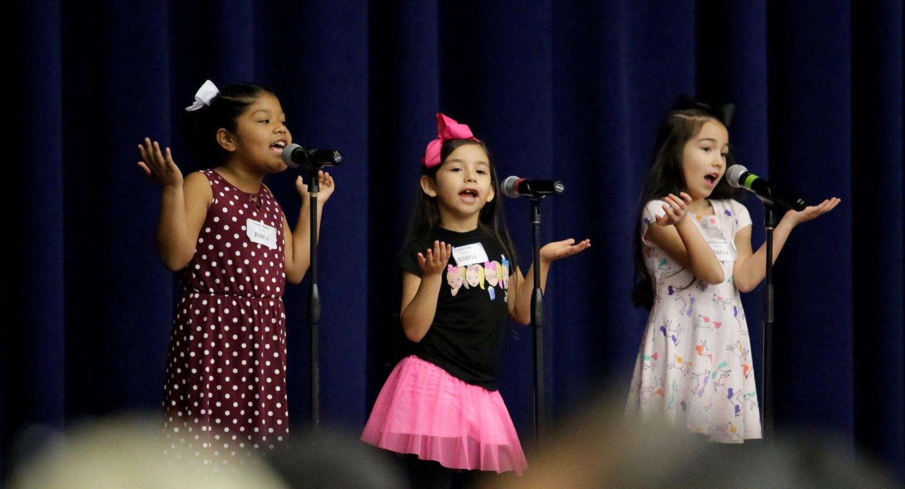 Students performing at Poetry & Prose