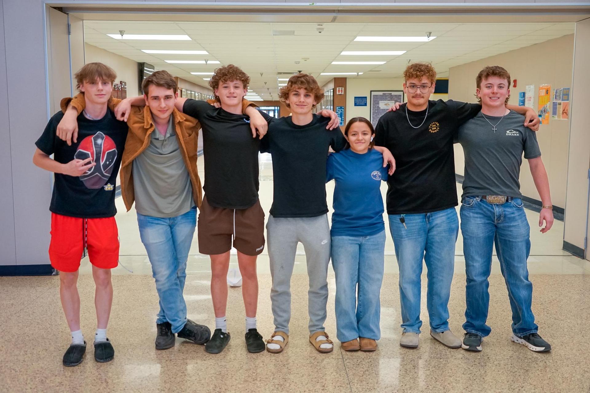 Group of seven students who will go through the Fire Academy program
