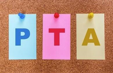 PTA letters push-pinned to corkboard