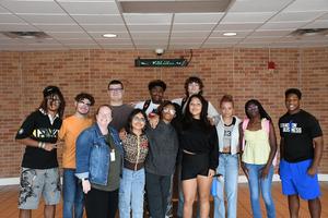 PAL and Pathway students with Ashley O Niel standing and smiling for the camera