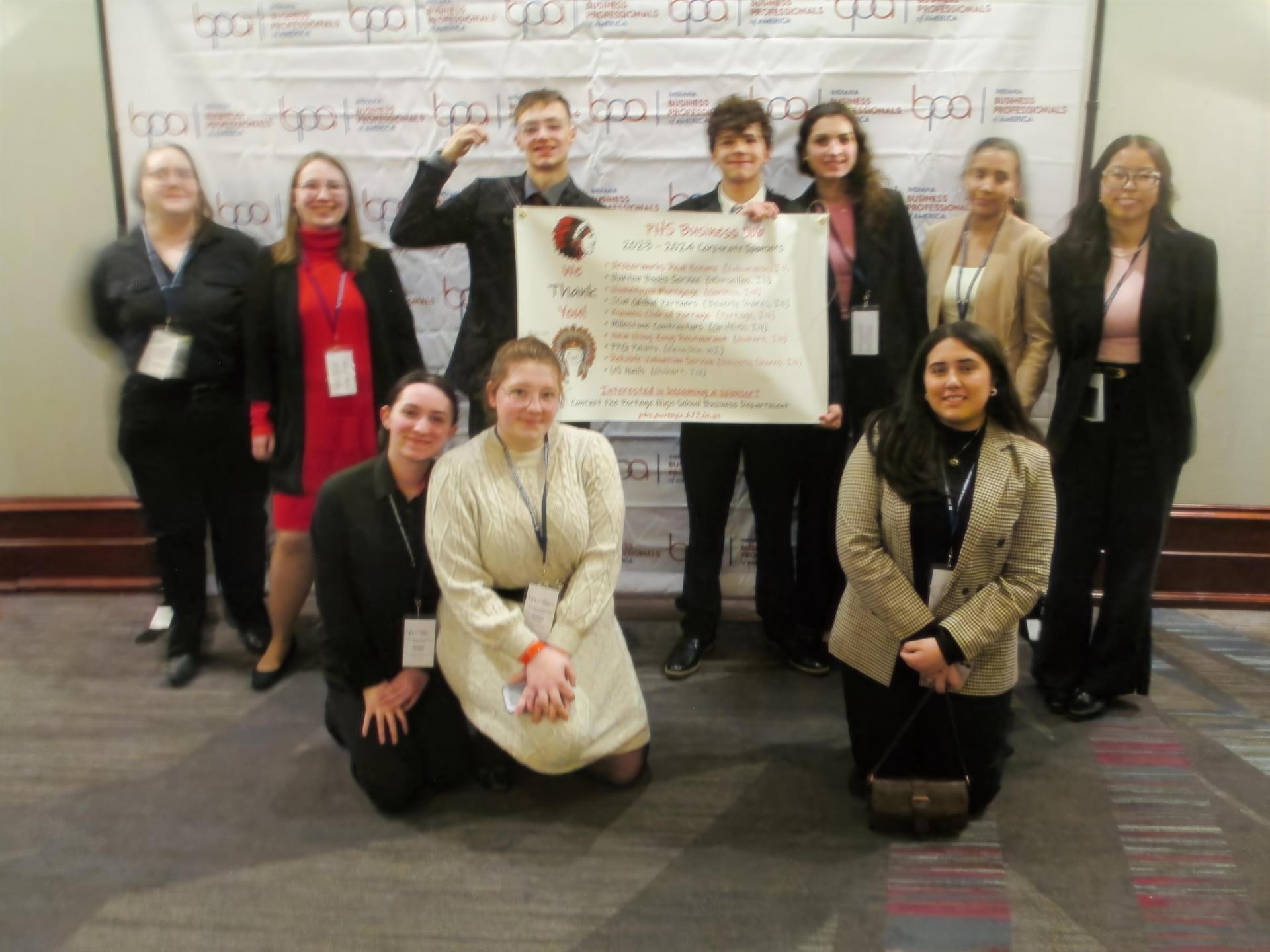 group of students with award