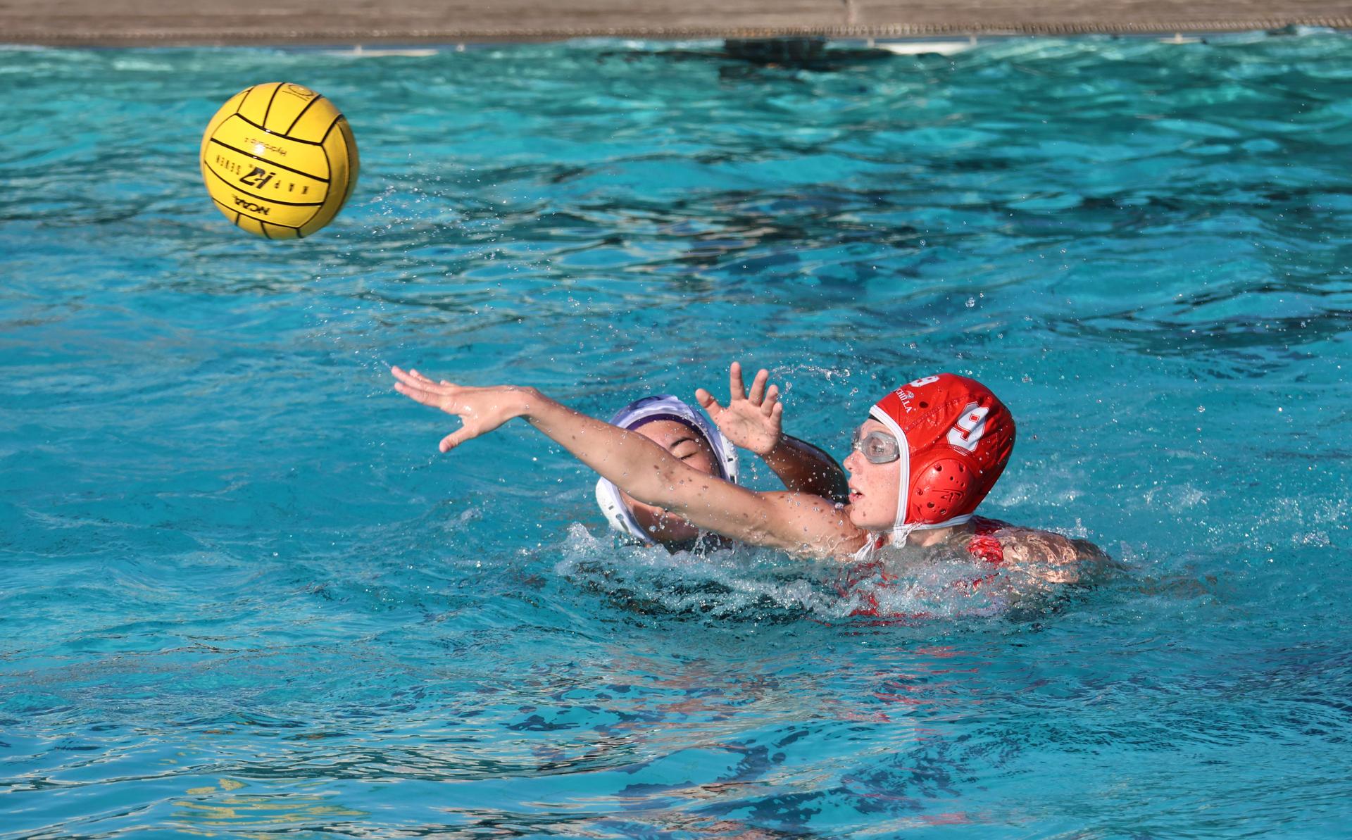 girls playing water polo against Sanger West