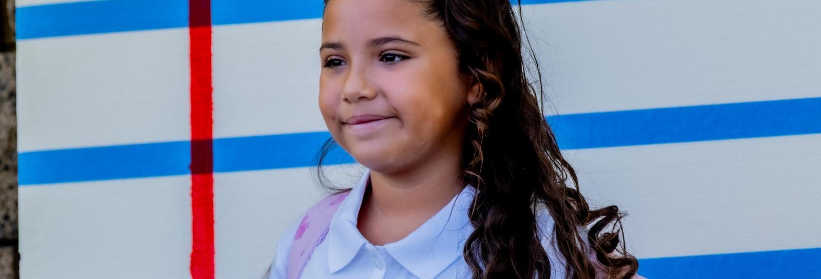 female student looks at camera