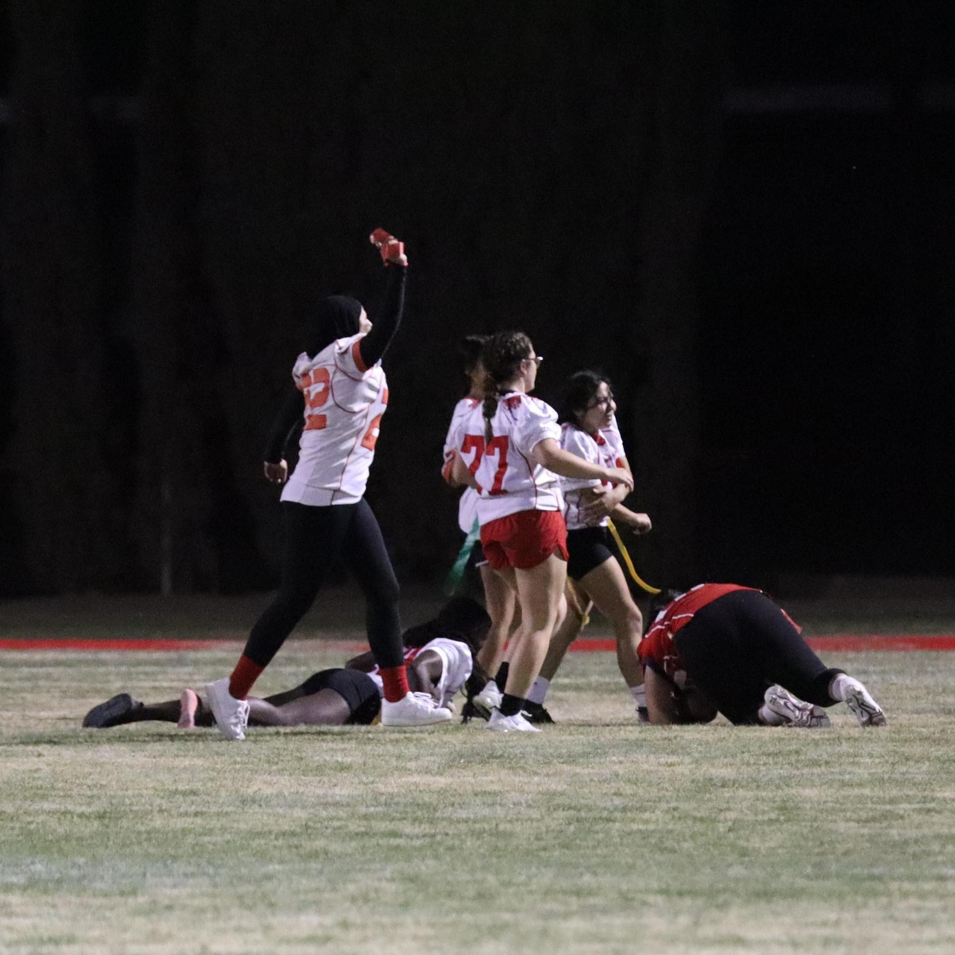 girls playing flag football