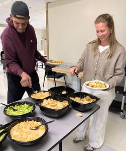 Teachers selecting lunch.