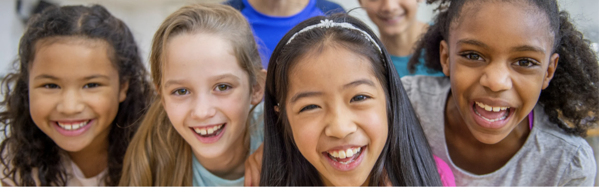 A group of smiling young kids