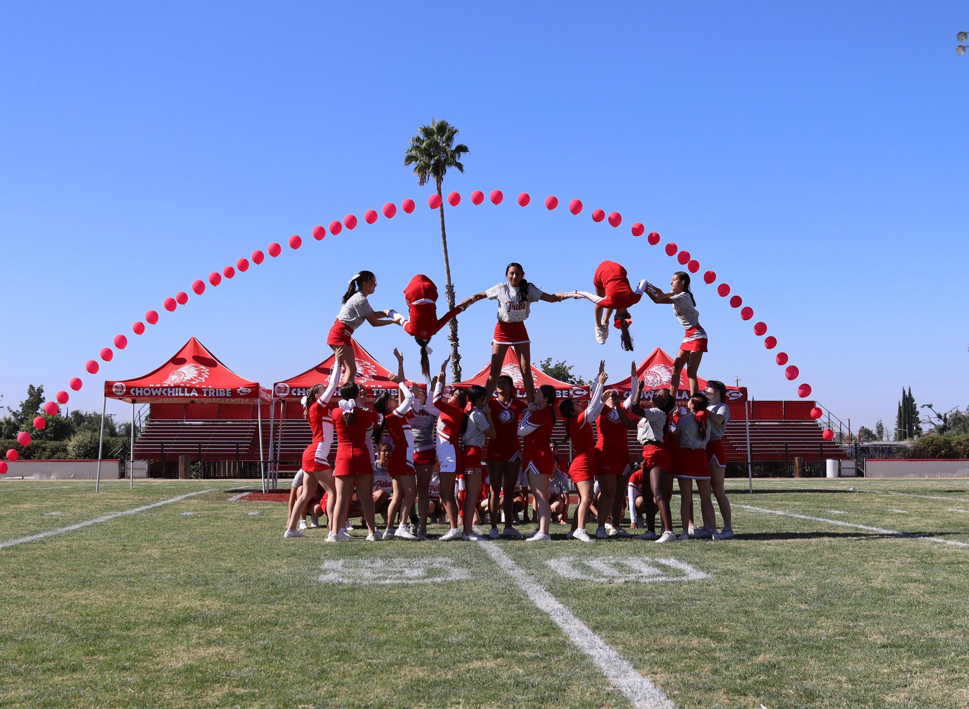 students and staff at the homecoming rally