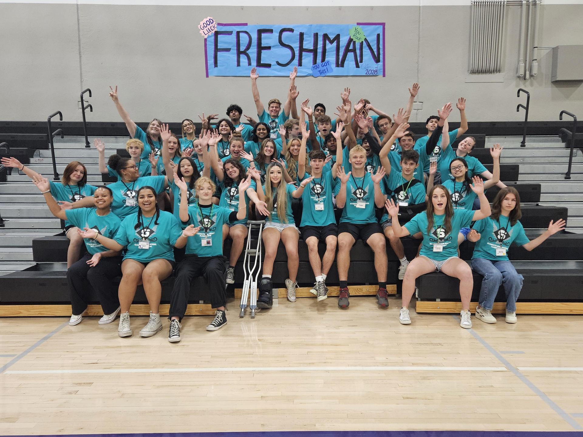 2024 Flight Crew student team in blue shirts in Gym