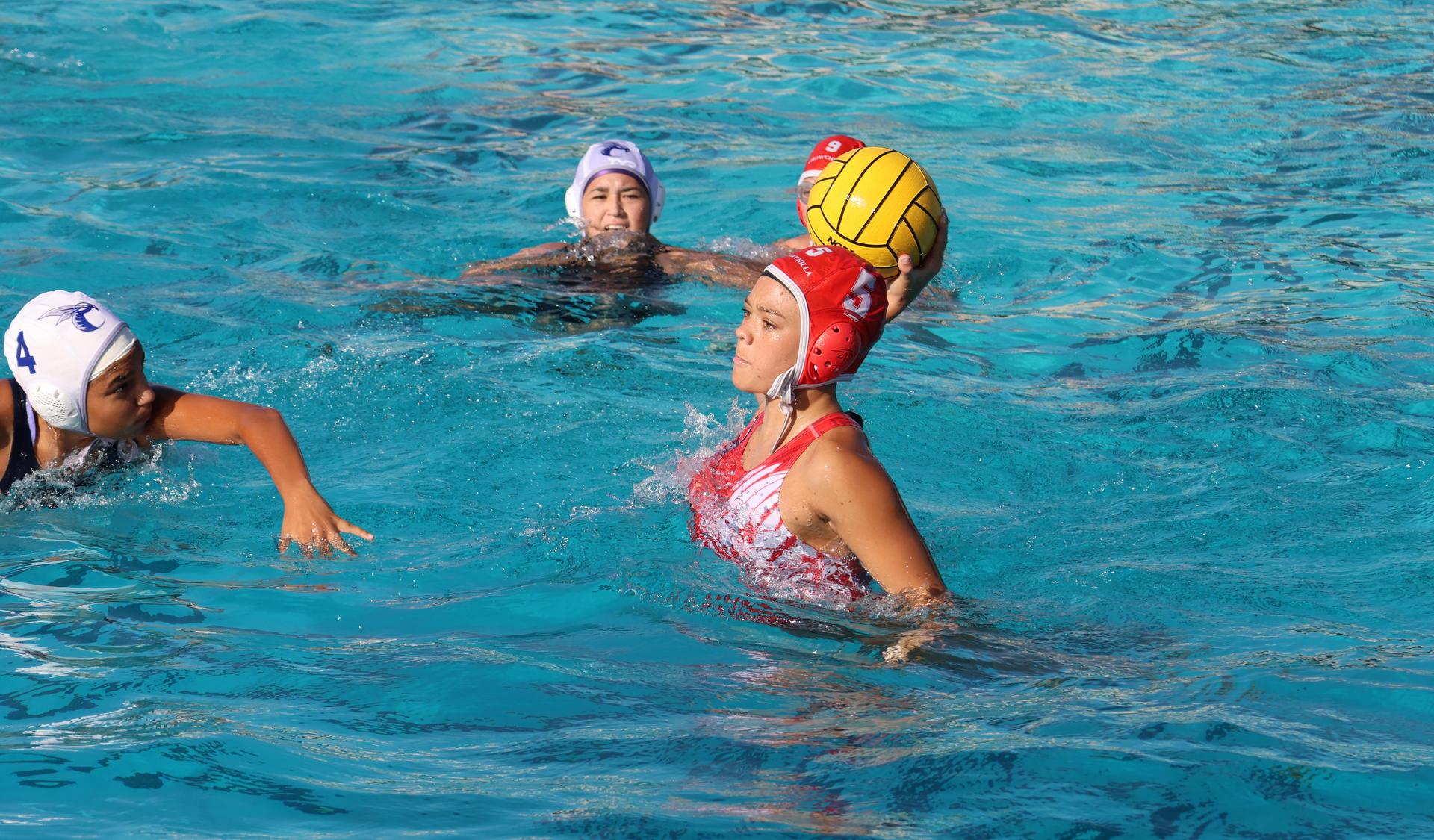 girls playing water polo against Sanger West
