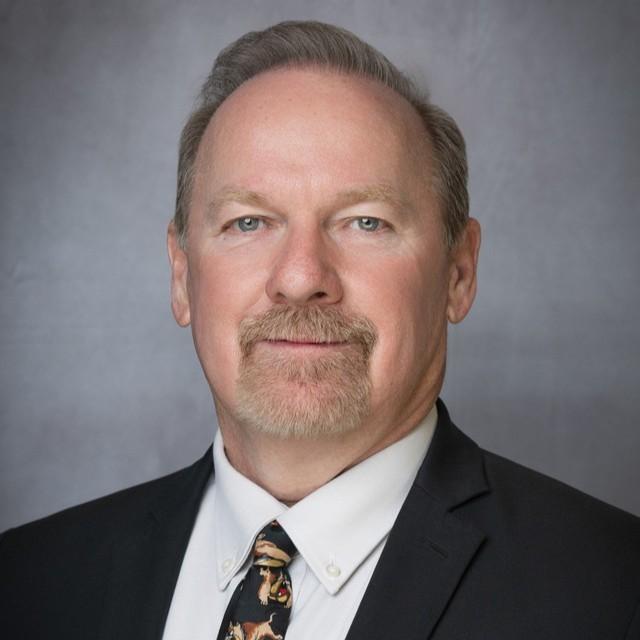 BUSHLAND Superintendent Dr. Tom Giles