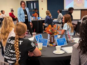Syd Sexton interacts with students during Big Cat Council meeting