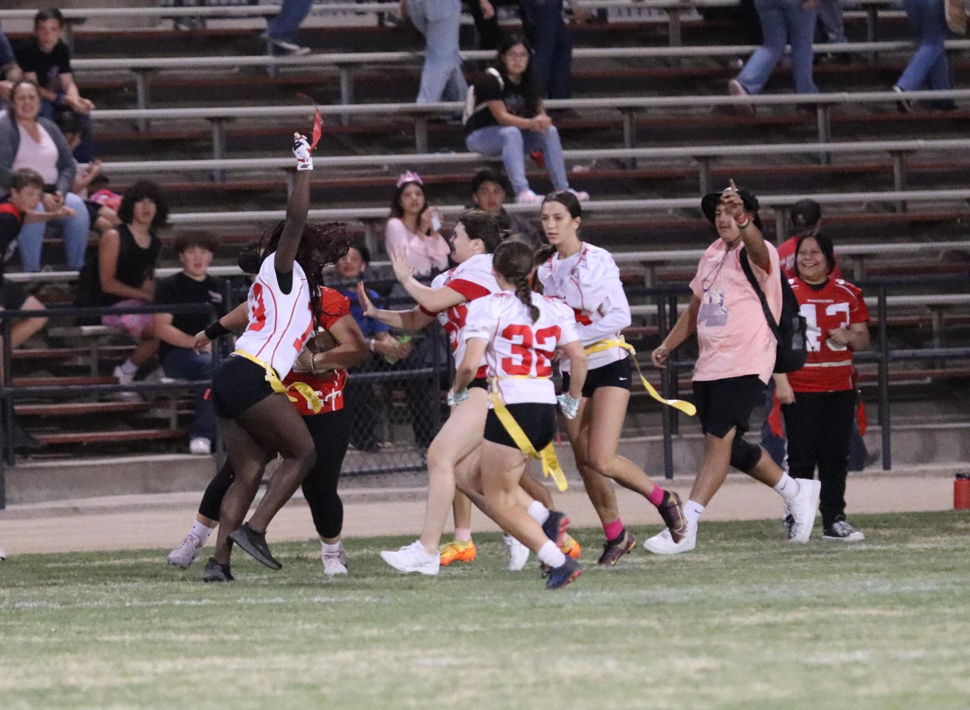 girls playing flag football