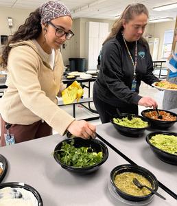 Teachers selecting lunch.
