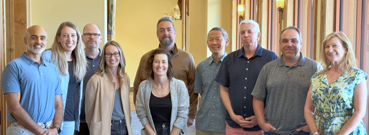 Saklan's Board of Trustees stand next to each other.