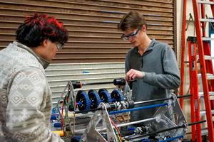 Two FHS engineering students working on a project.