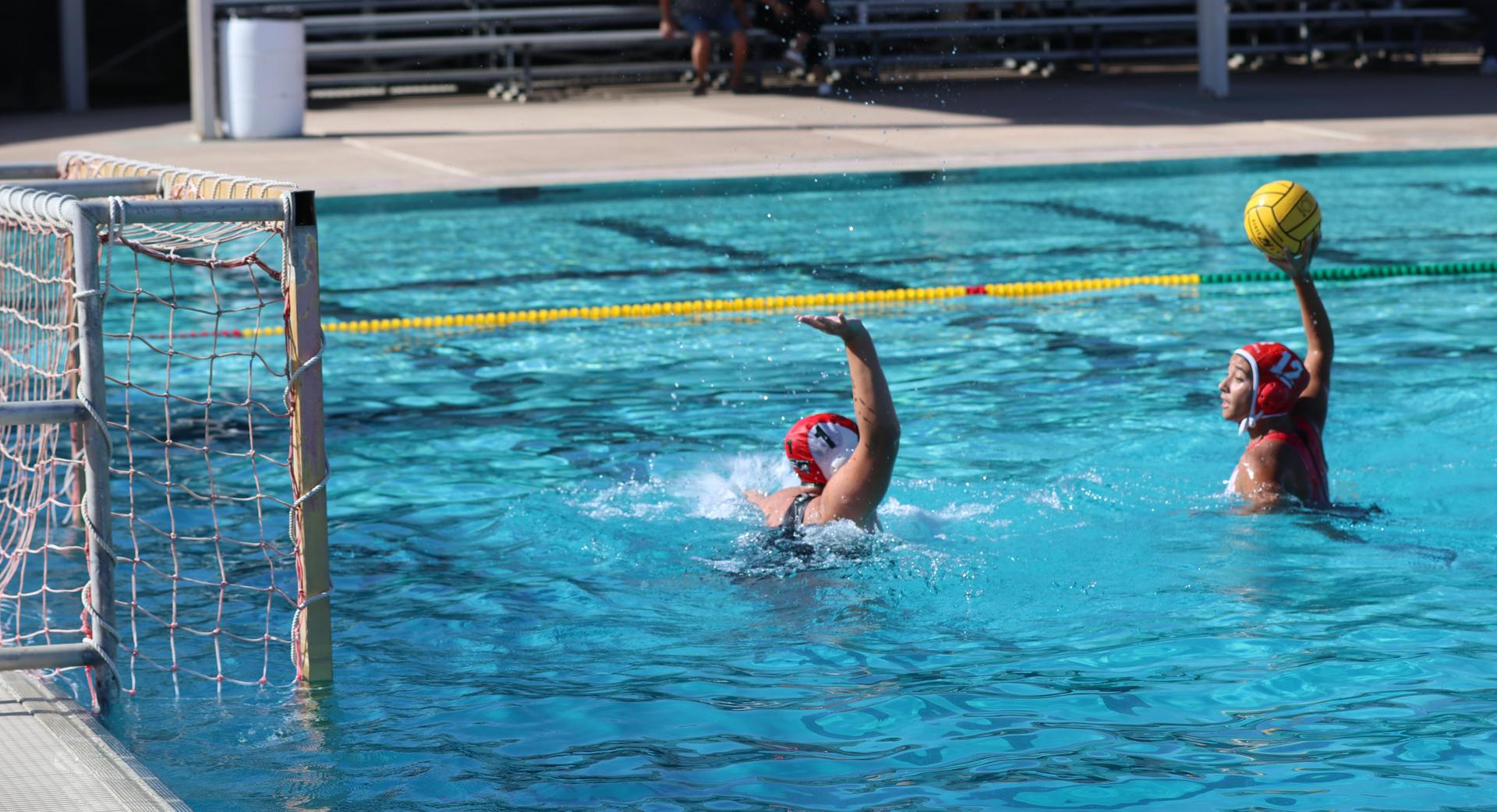 girls playing water polo against Hoover