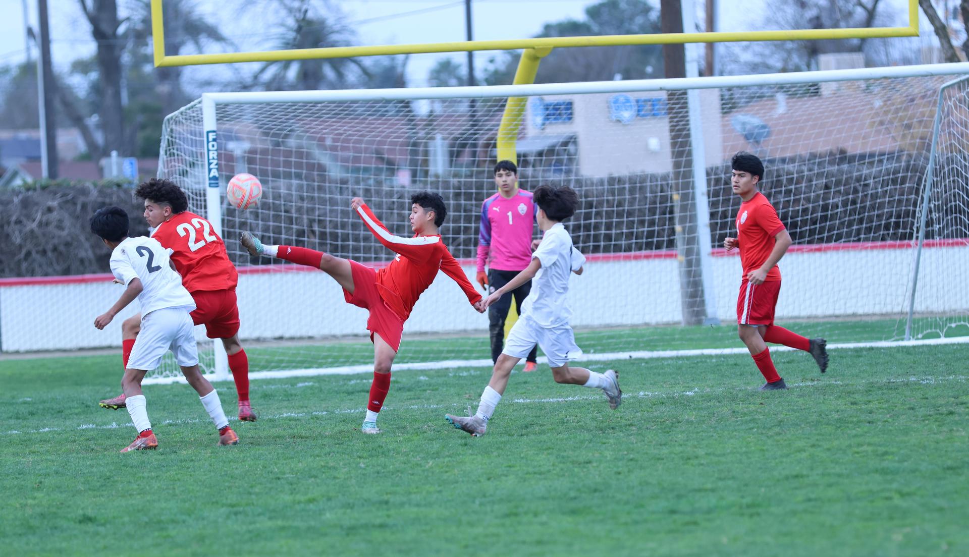 junior varsity boys playing soccer against washington union