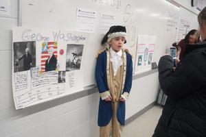A student portrays George Washington at the Wax Museum.