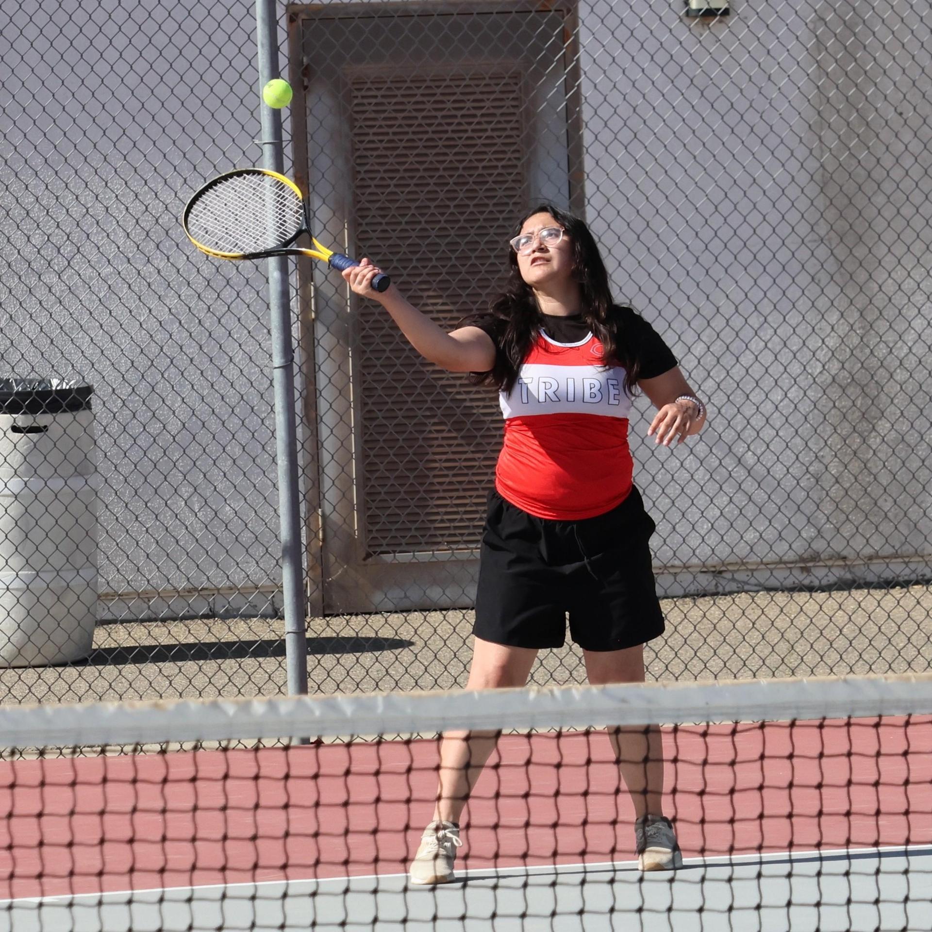 Girls tennis playing vs. Yosemite 2