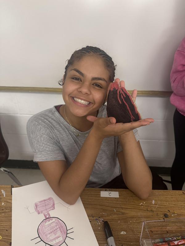 Student with painted rock