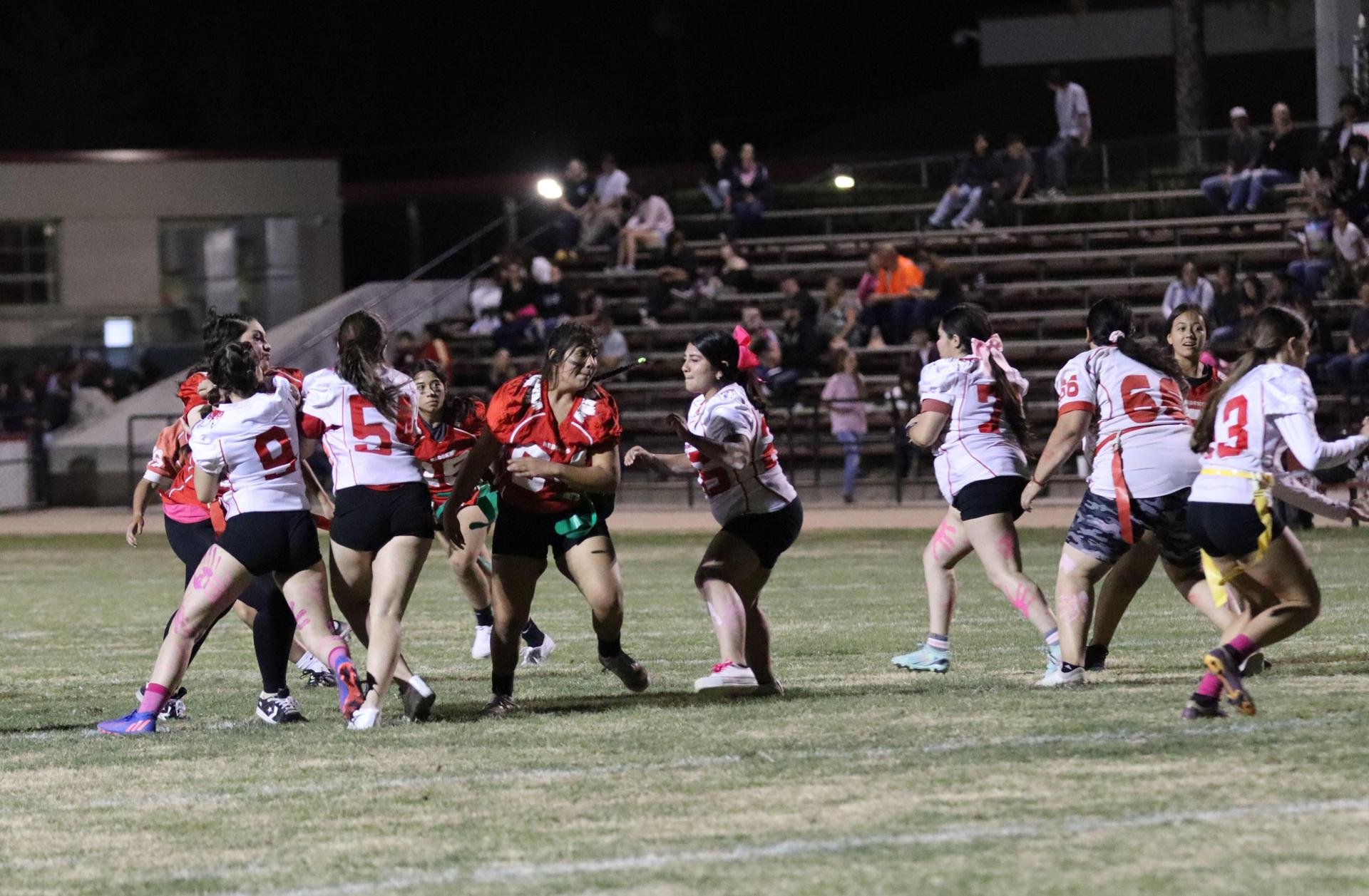 girls playing flag football