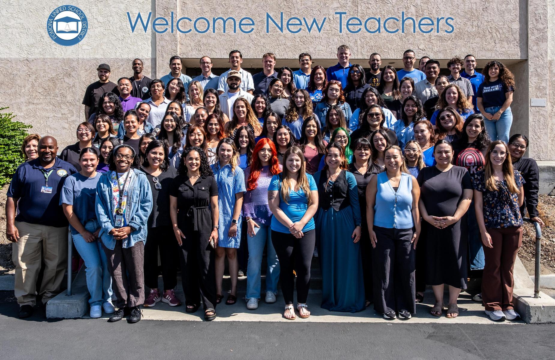 about 60 new teacher in group photo