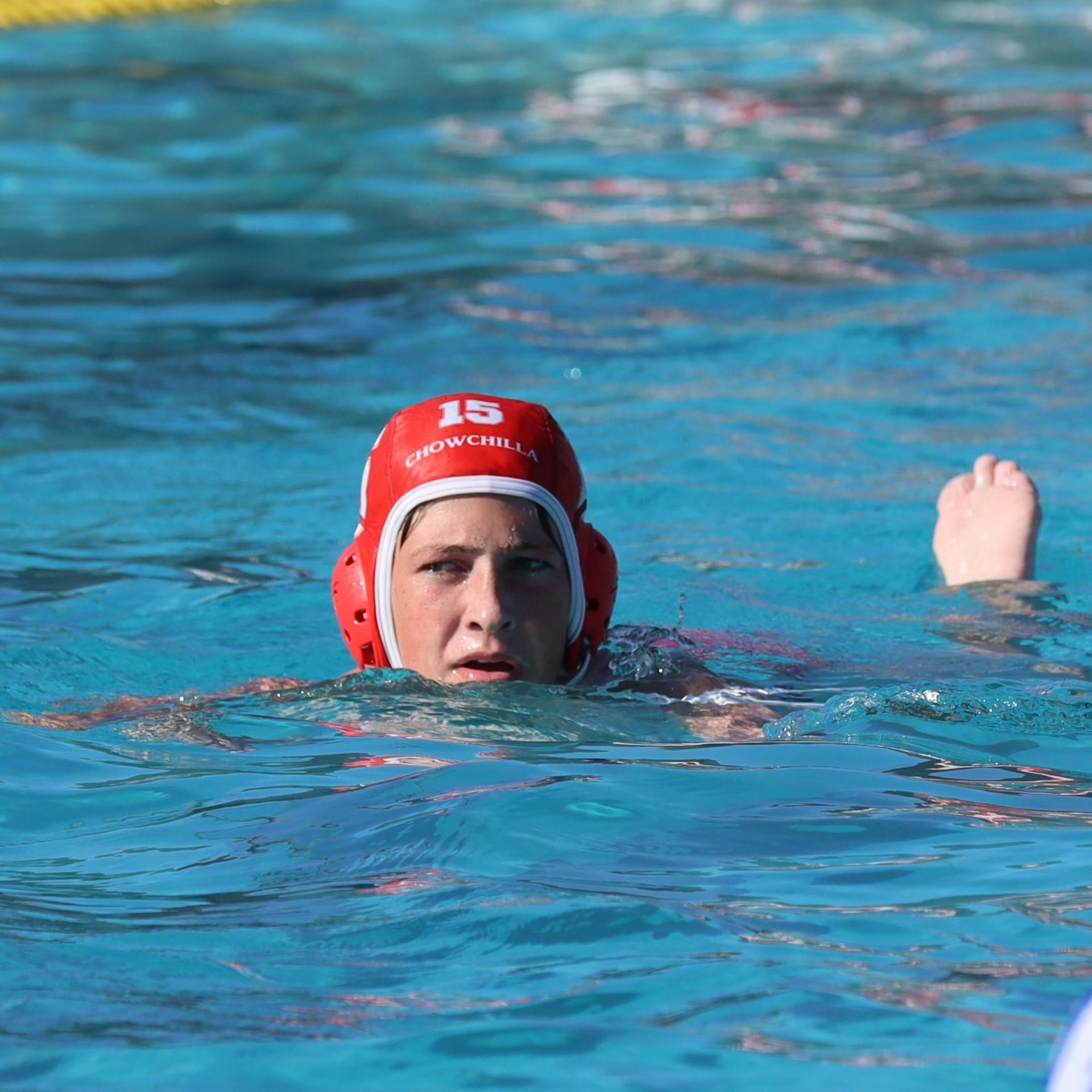 boys playing water polo against Madera