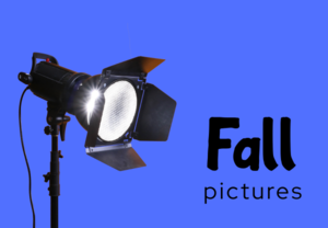 Spotlight on blue background shines on words "Fall Pictures".