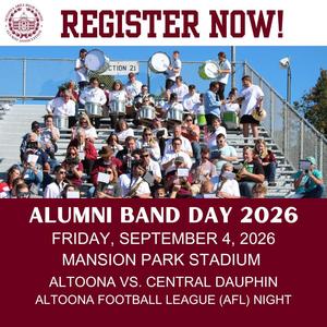 Alumni Band members sitting in the bleachers