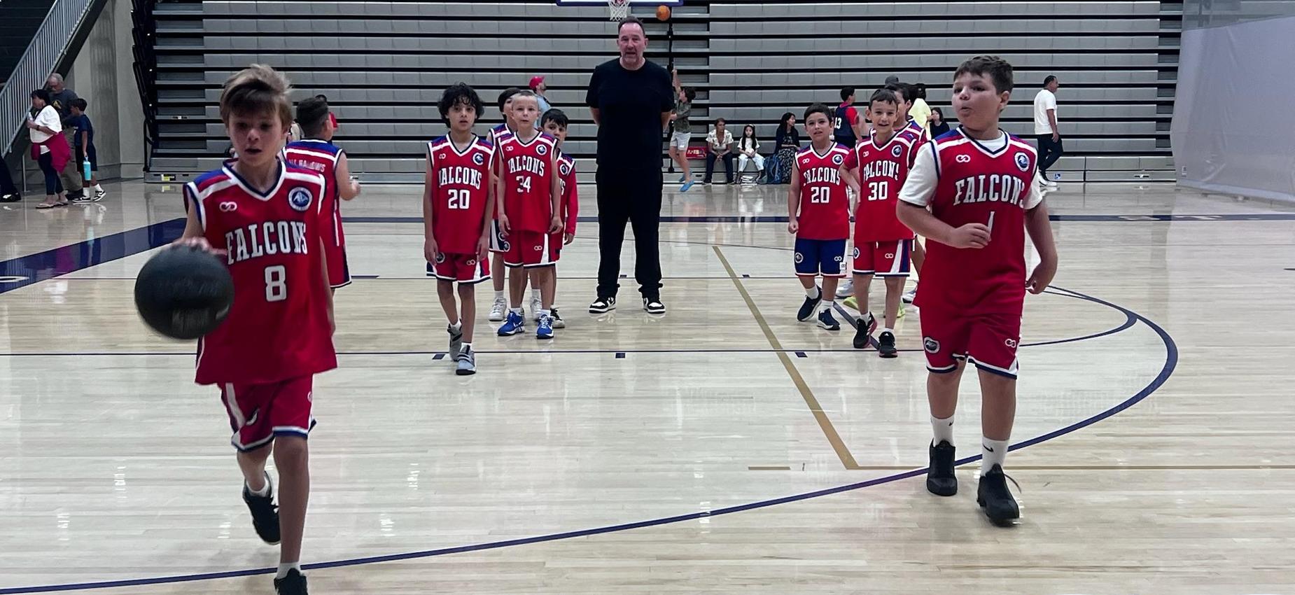 Boys Basketball team warms up before a game