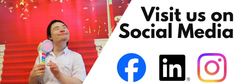 Person holding a colorful item with social media logos and a celebratory background.