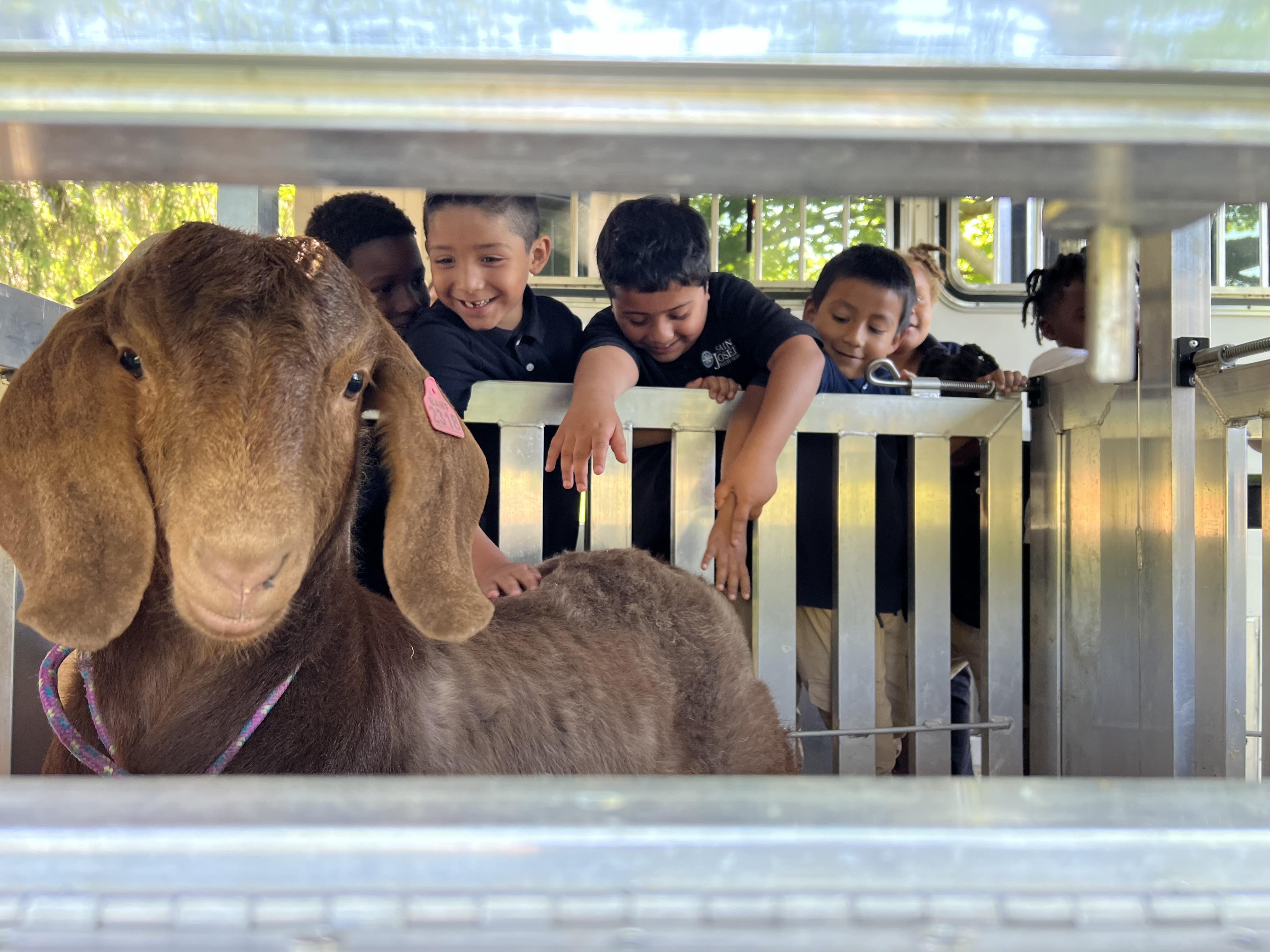 Countryside Academy Goat and students