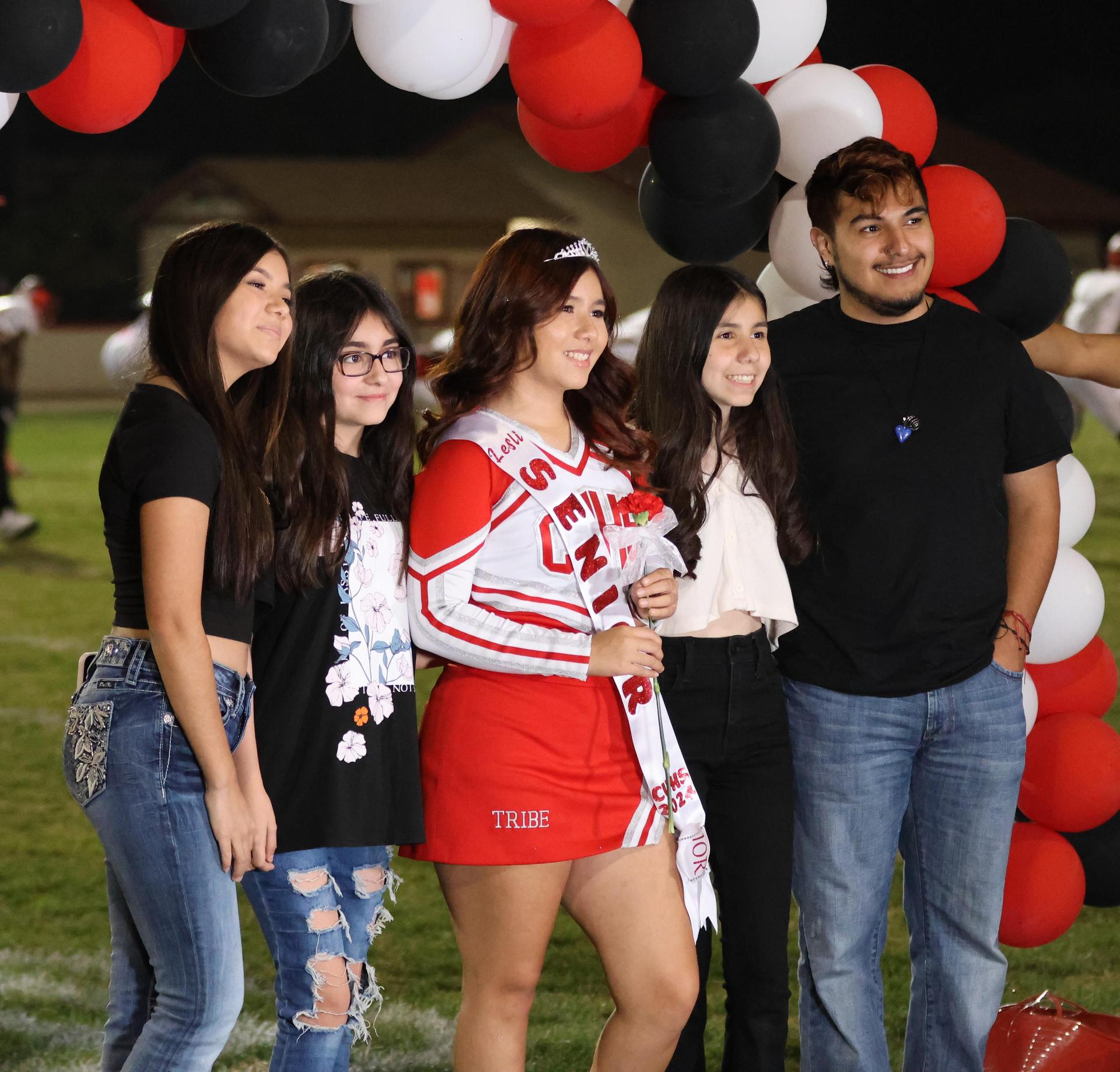 seniors and their escorts celebrating senior night