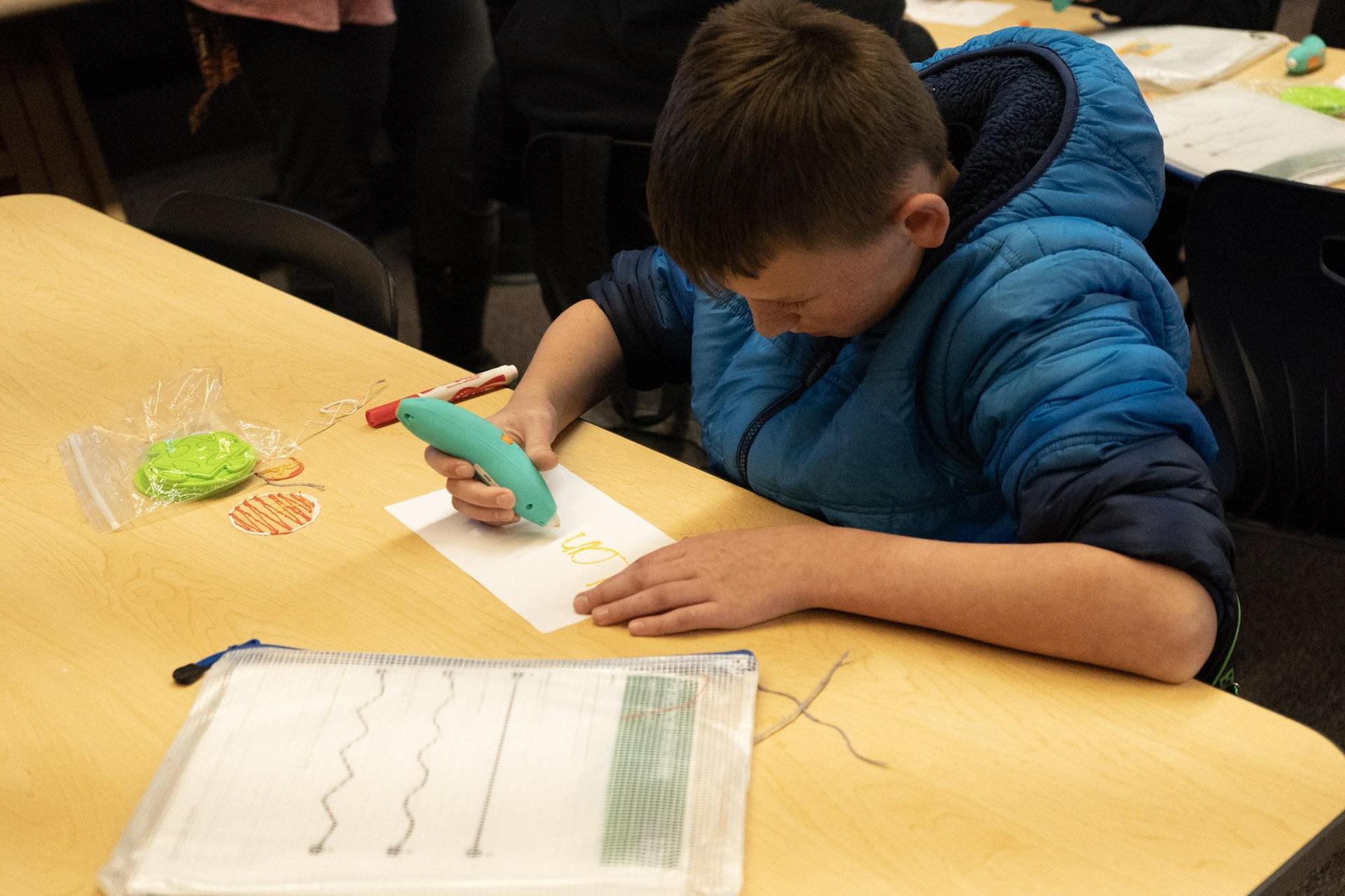 TCSD Student doing a robotic science project. 