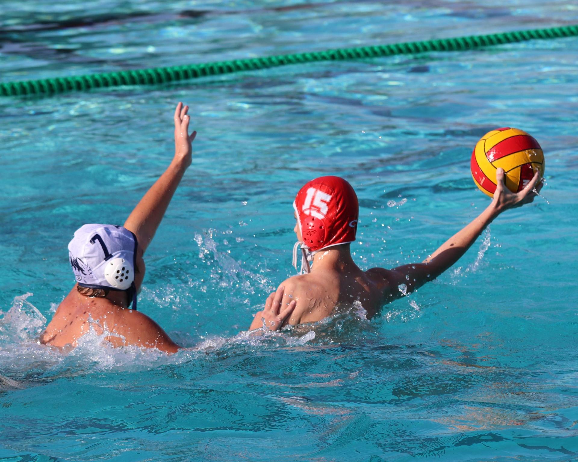 Boys playing water polo against Yosemite