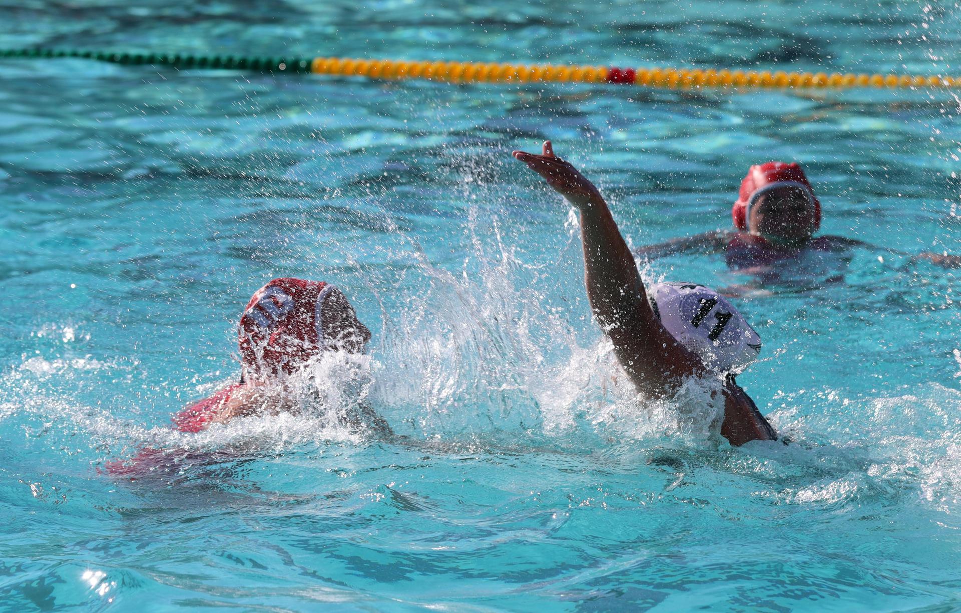 girls playing water polo against Hoover