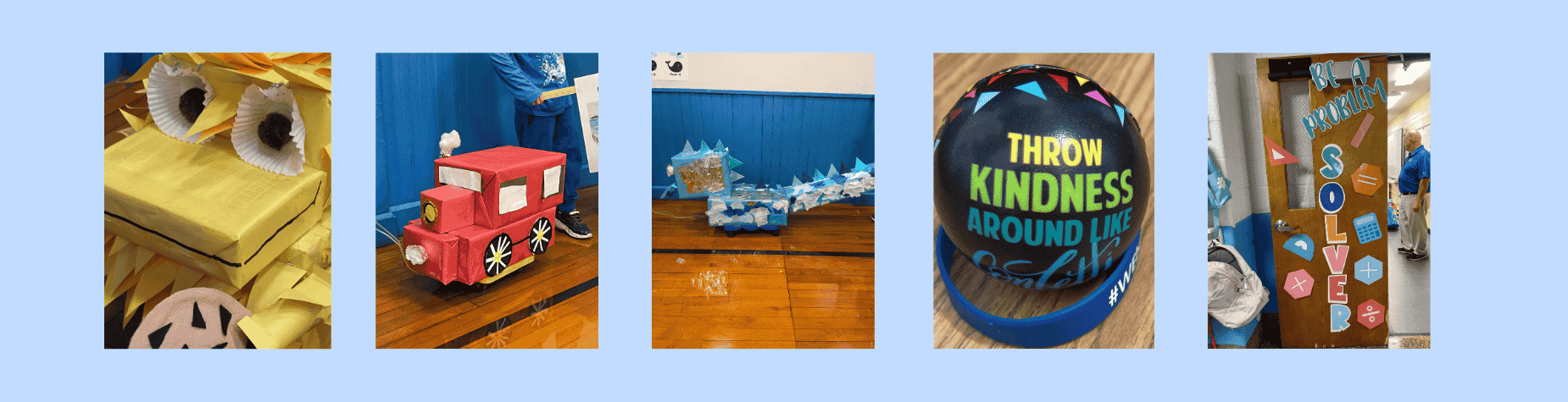 Decorative kindness-themed displays and a train-shaped craft in a school.