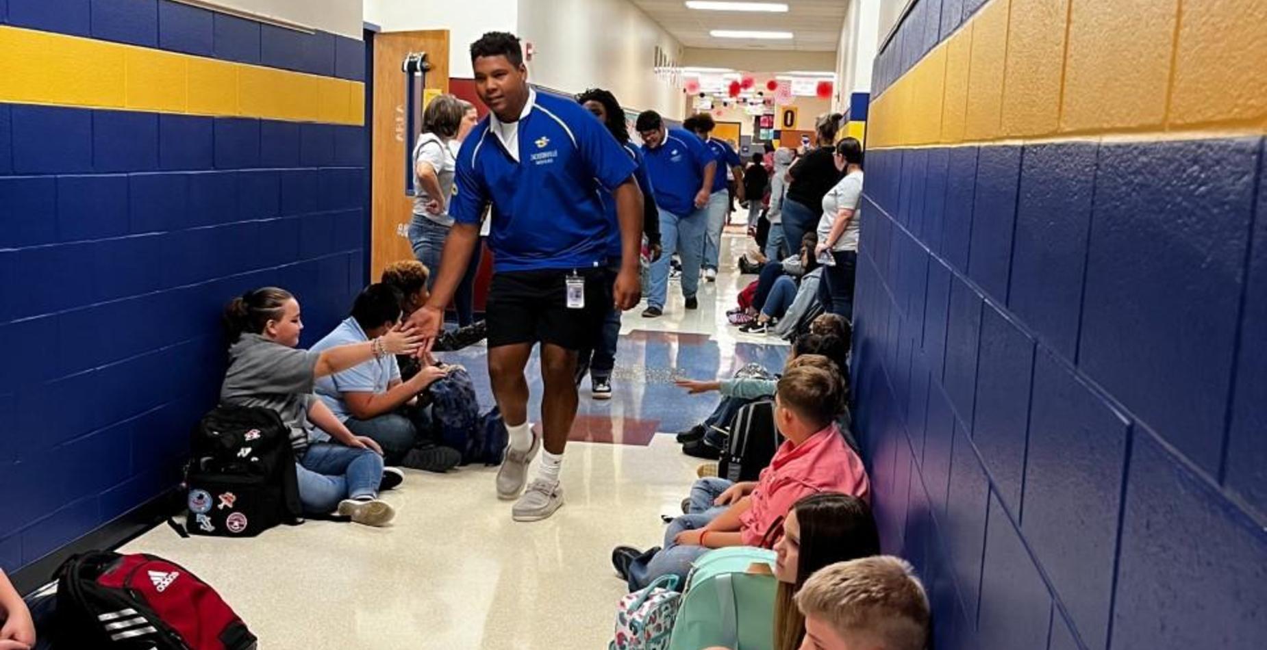 Football players visit Nichols