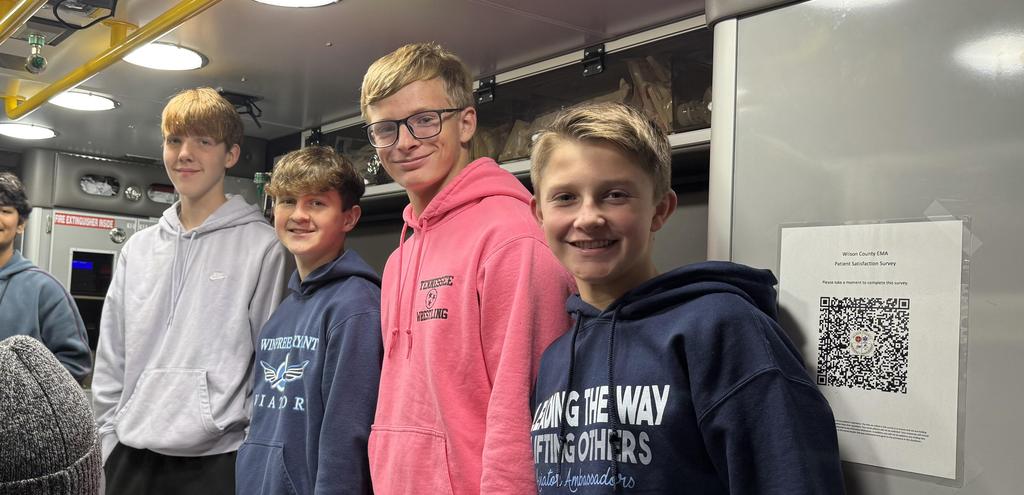 Students smiling at the career expo