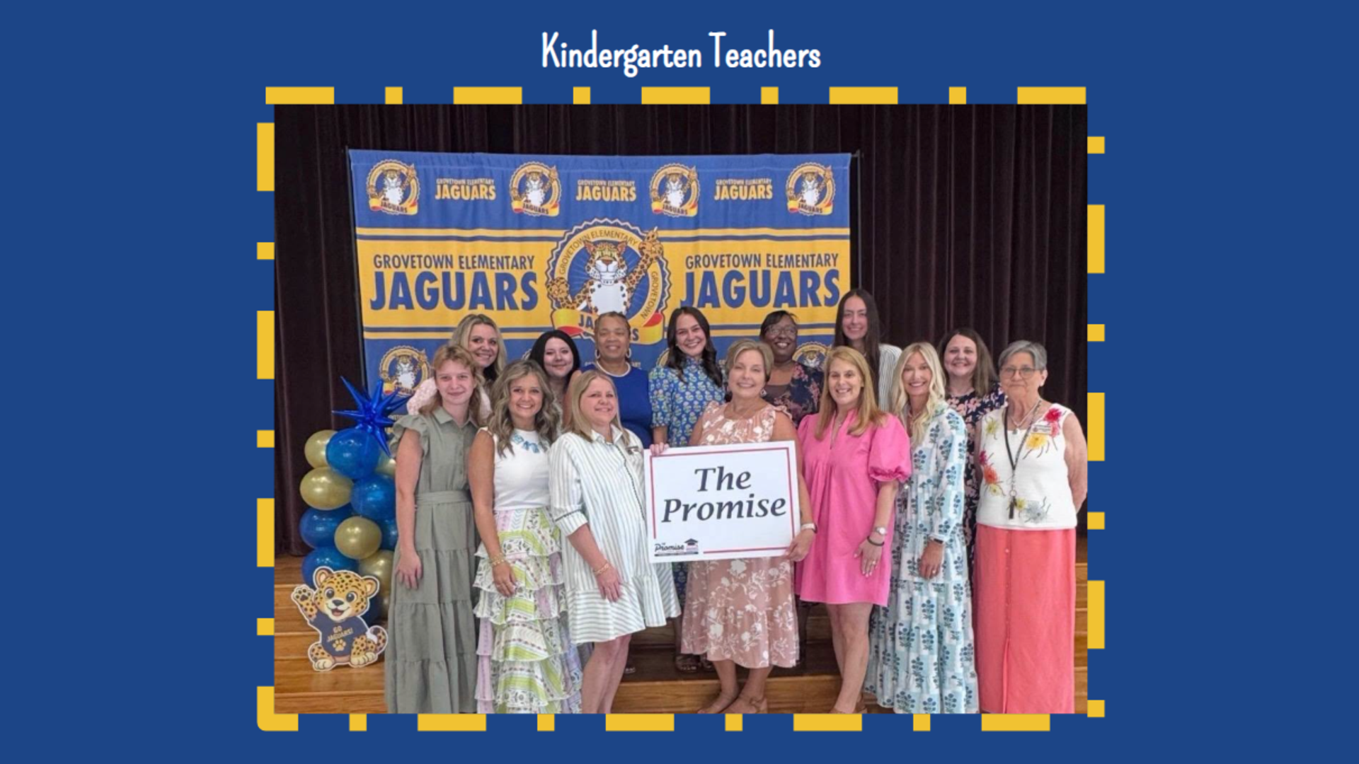 Group of kindergarten teachers posing with a sign that says 'The Promise'.