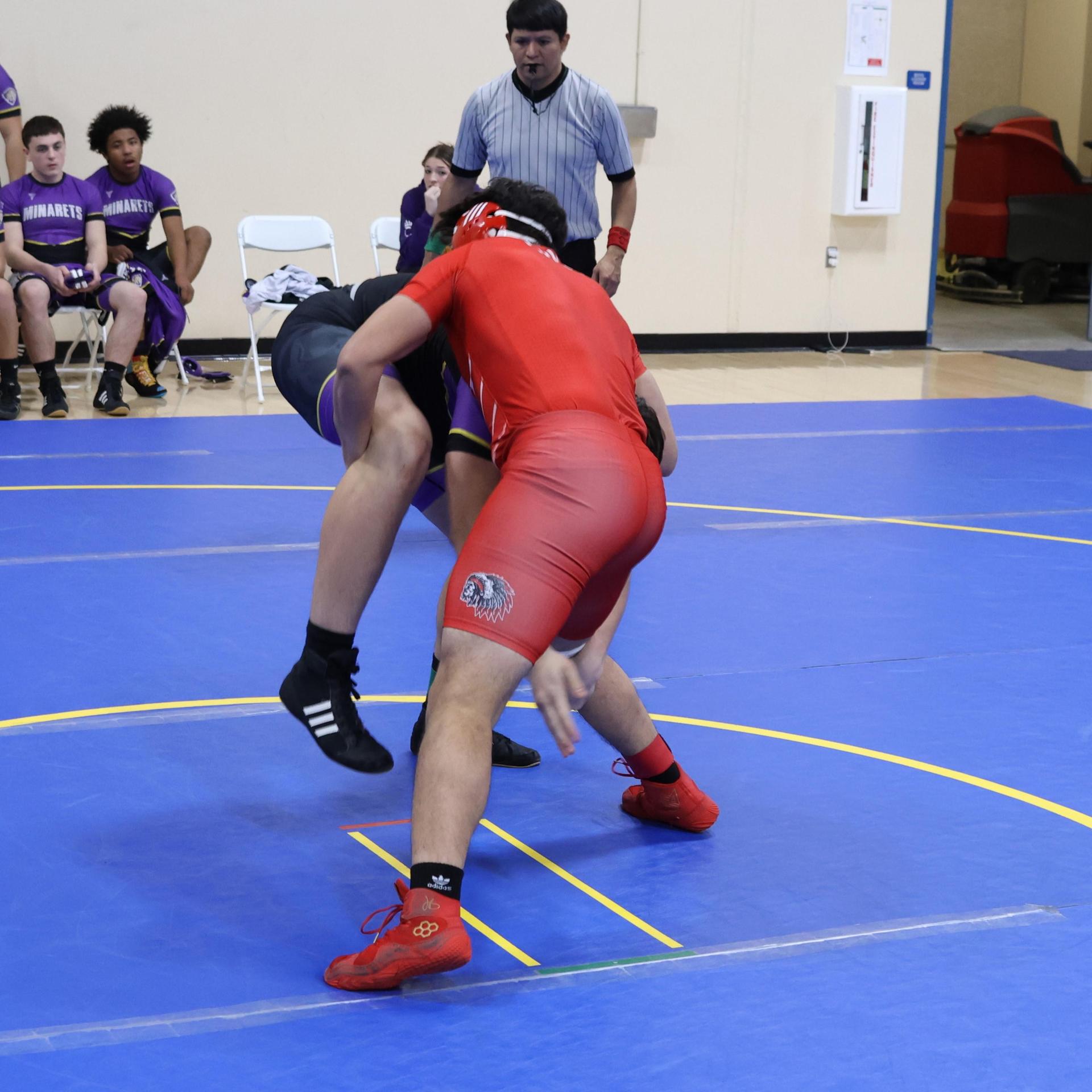 wrestlers in action at parlier