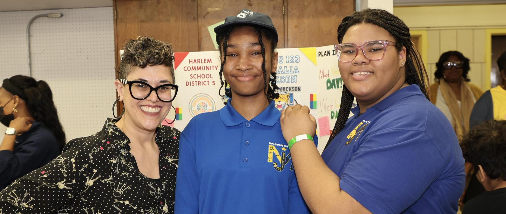 Teacher and students smiling