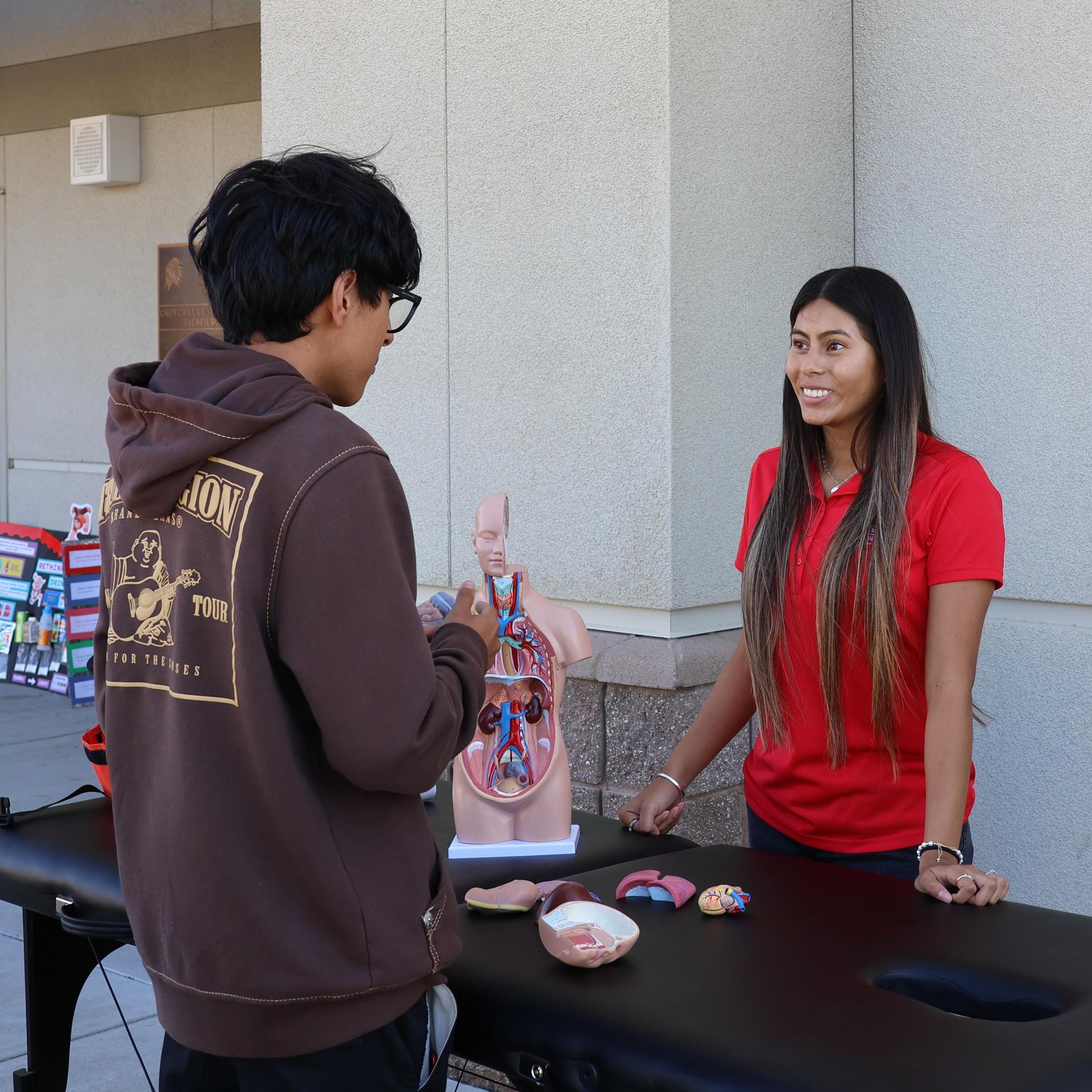 Mrs. Parsons class members speaking to other students